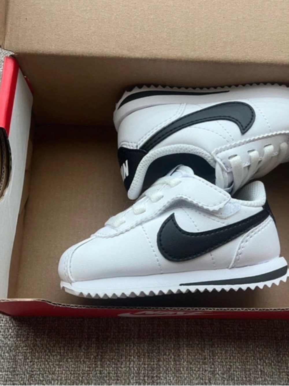 Nike Kids White Sneakers with Black Swoosh Velcro